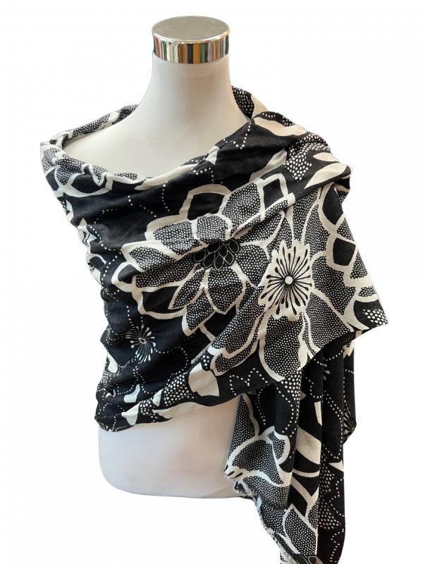 image of black floral patterned cashmere wrap on mannequin