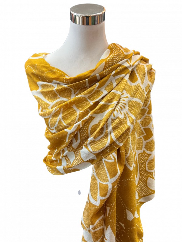 image of a yellow patterned cashmere wrap on mannequin
